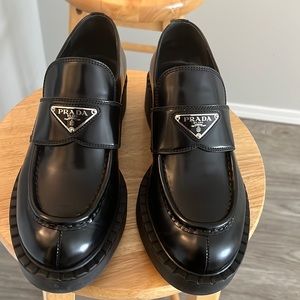 Black leather Prada loafers . Womens Size 38.